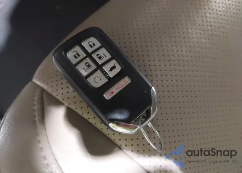 2020 Honda Odyssey Elite z USA, uszkodzony, nr VIN 5FNRL6H9XLB019455